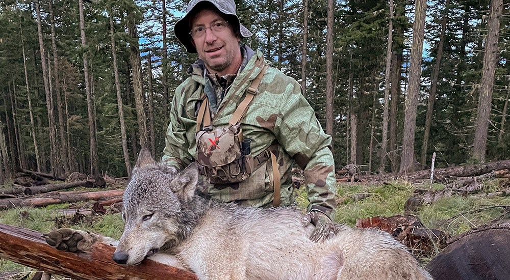 Idaho hunter with Wolf