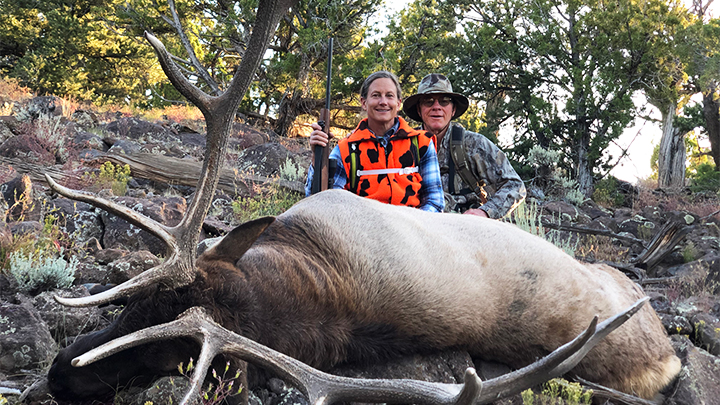 Hunters with large bull elk