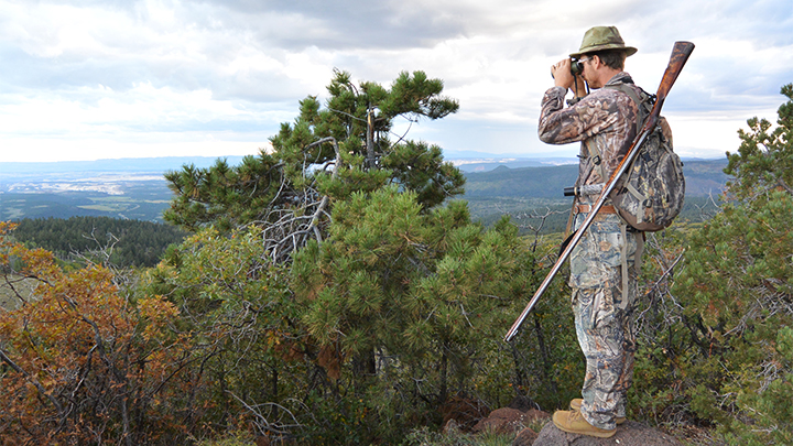 Hunter Scouting for Elk with Binocular