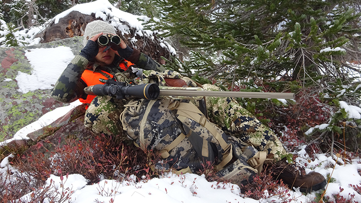 Elk Hunter Glassing on Side of Ridge