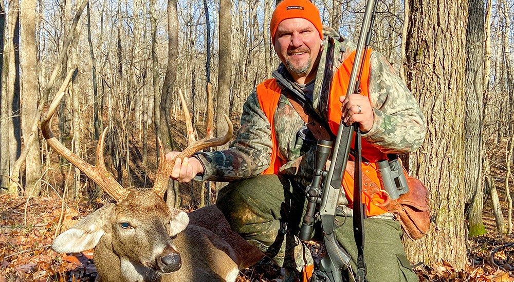 Male Hunter with Kentucky Whitetail Buck