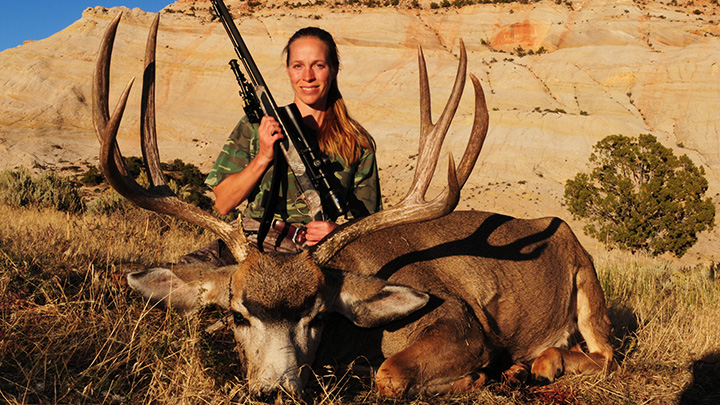 Female Hunter with Mule Deer
