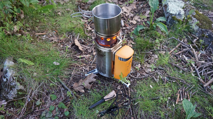 CampStove 2 boiling water in a camp cup, at the author&#x27;s campsite