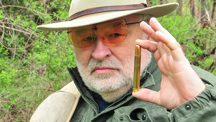 Hunter Holding Ammunition Cartridge