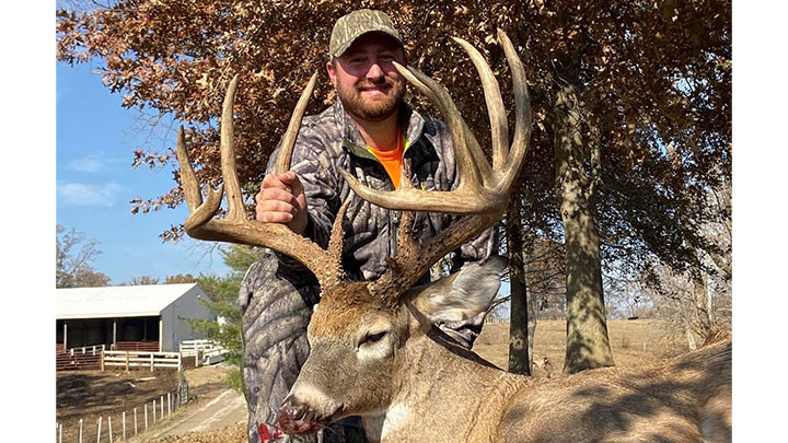 Hunter with Whitetail Buck scoring 198 4/8 inches, taken in Bollinger County, Missouri.