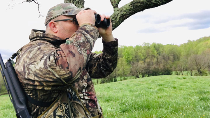 Hunter glassing a field