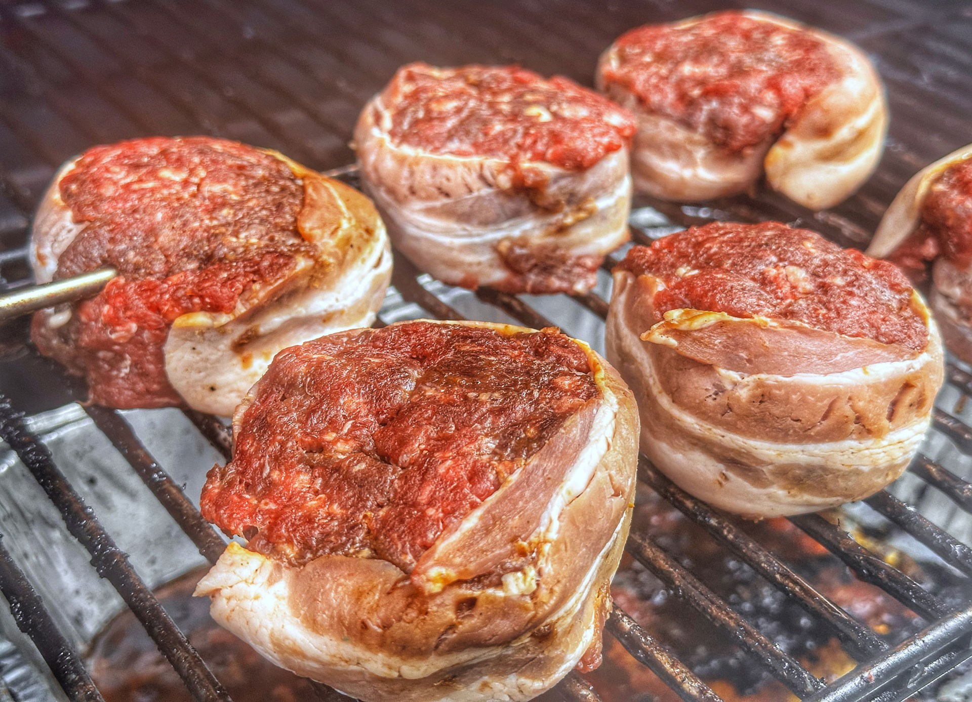Bacon rolled elk burgers