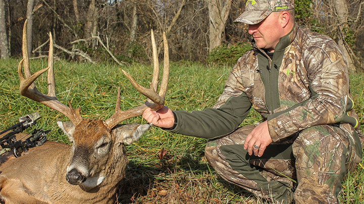 Hunter with Large Whitetail Buck