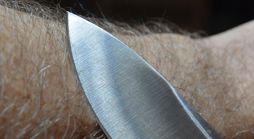 Testing Knife Sharpness on Arm Hair