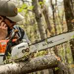Man With Chainsaw And Tetra (1)