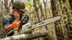 Man With Chainsaw And Tetra (1)