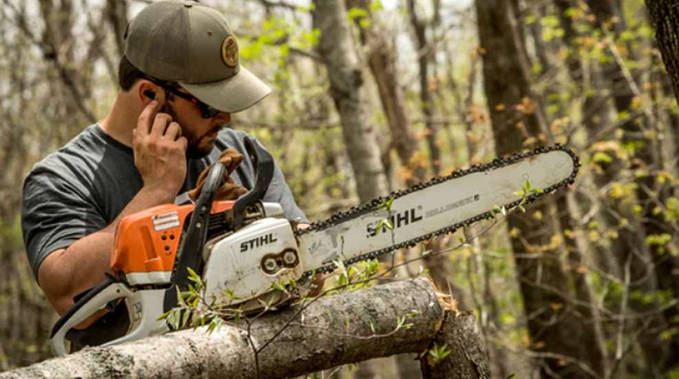 Man With Chainsaw And Tetra (1)