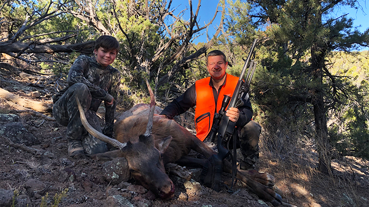 Hunters with spike bull elk