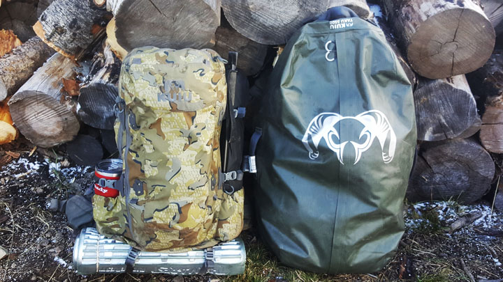 Kuiu&#x27;s PRO LT Pack System, with a 3200-ci. bag in Valo, is pictured next to the company&#x27;s Taku 5500 duffel.