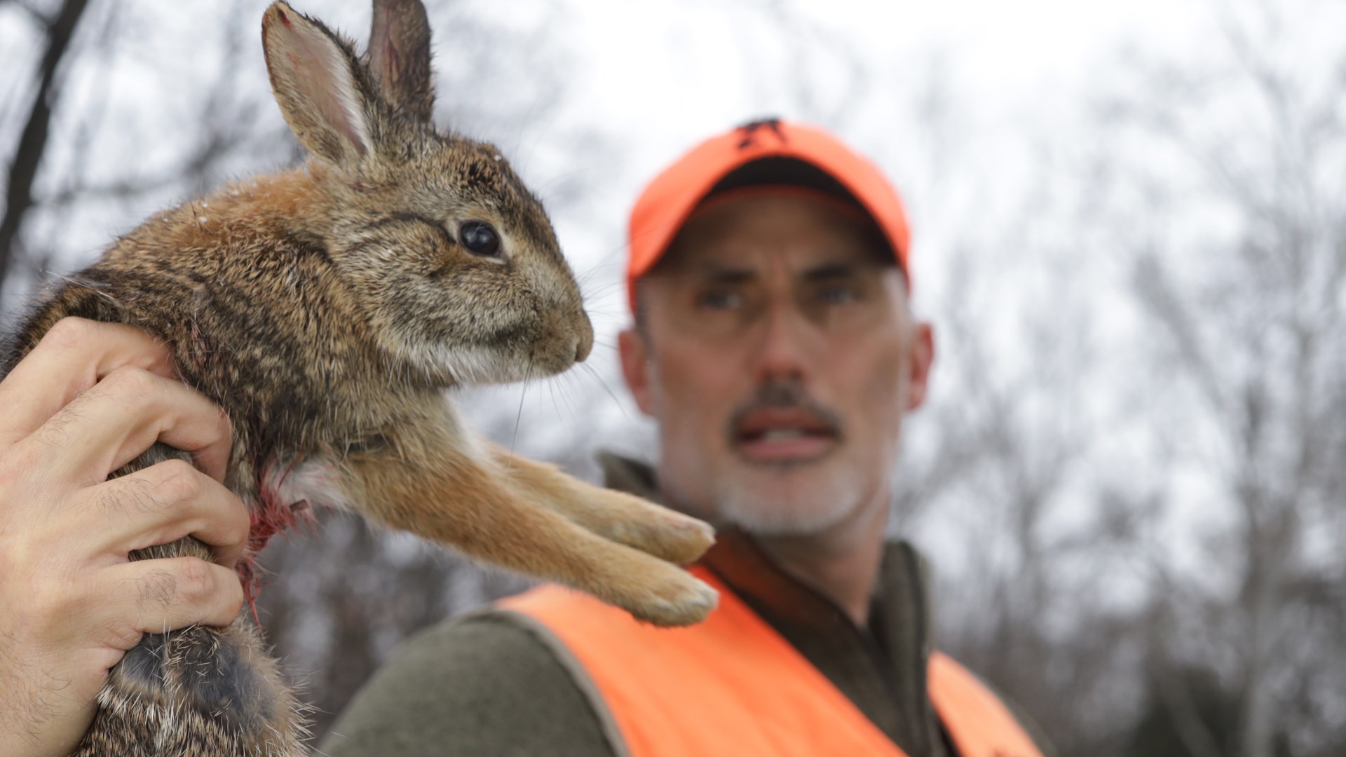 Hunter with rabbit