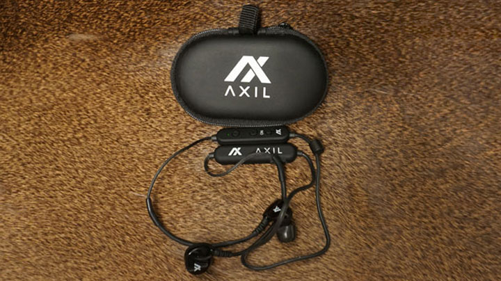 Axil Ghost Stryke Extreme Earbuds on a deer rug