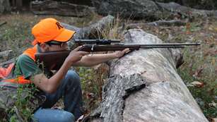 SHOOTER, JACK ELLIS WITH MODEL 34 REMINGTON