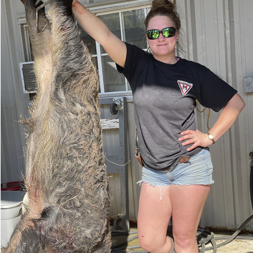 Holly Hearn with Hanging Hog