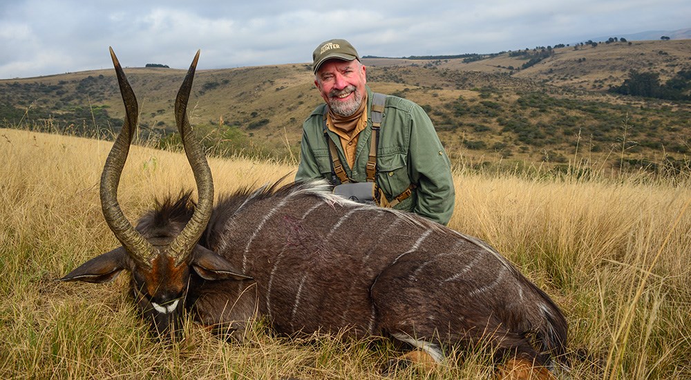 Hunter posing with nyala taken in South Africa.