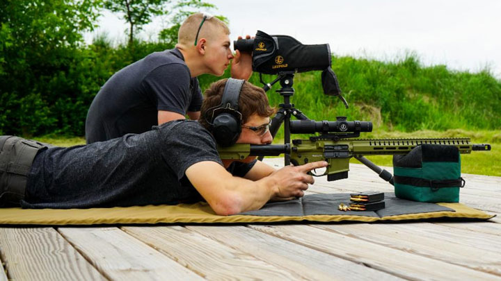 A shooter/spotter team shooting a CMMG resolute or Endavor on the range