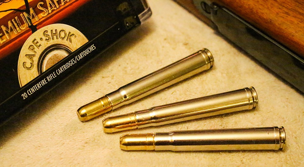 Federal Premium Safari Cape Shok .375 H&H Magnum ammunition cartridges laying on table.