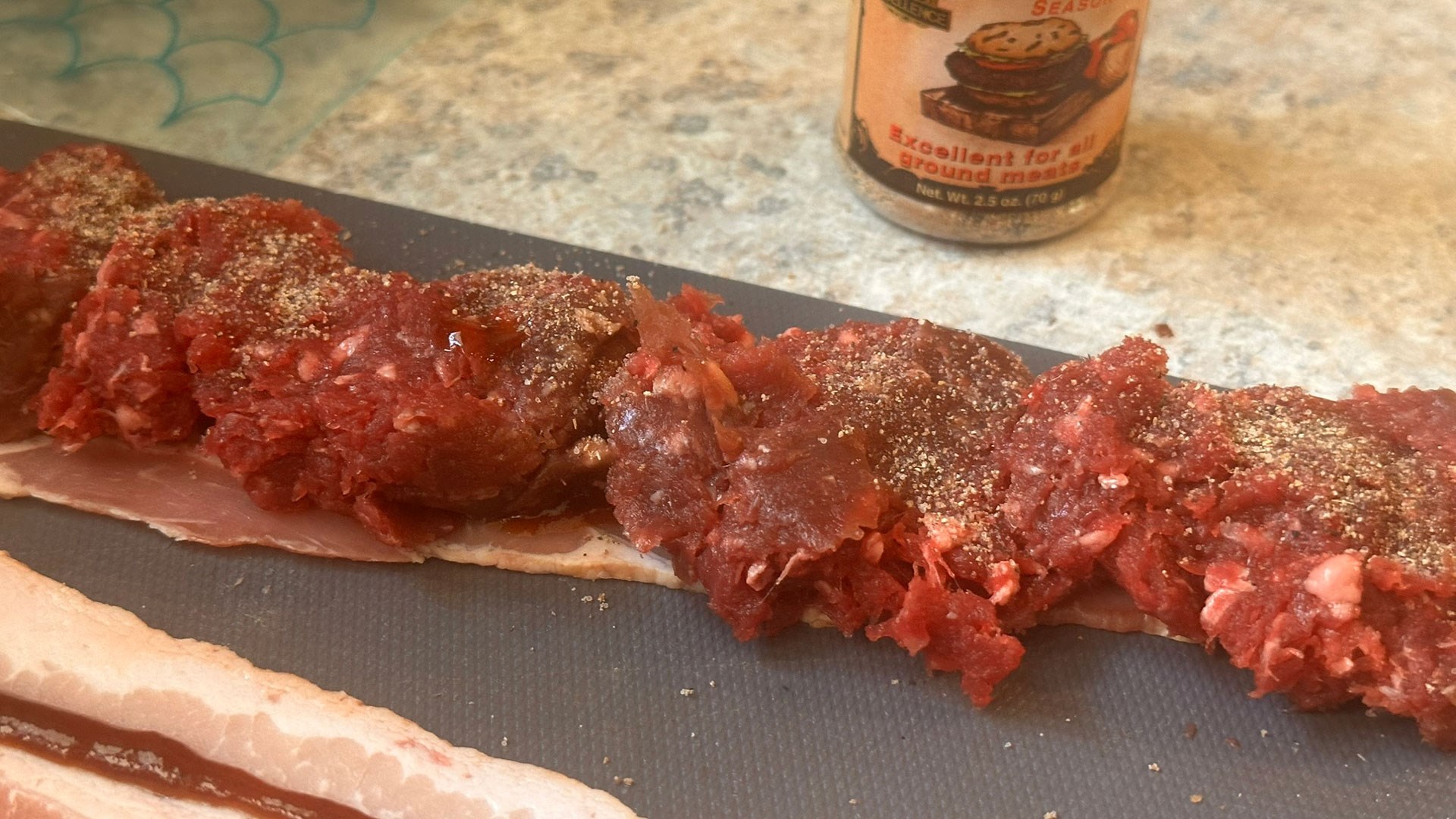 Bacon rolled elk burgers