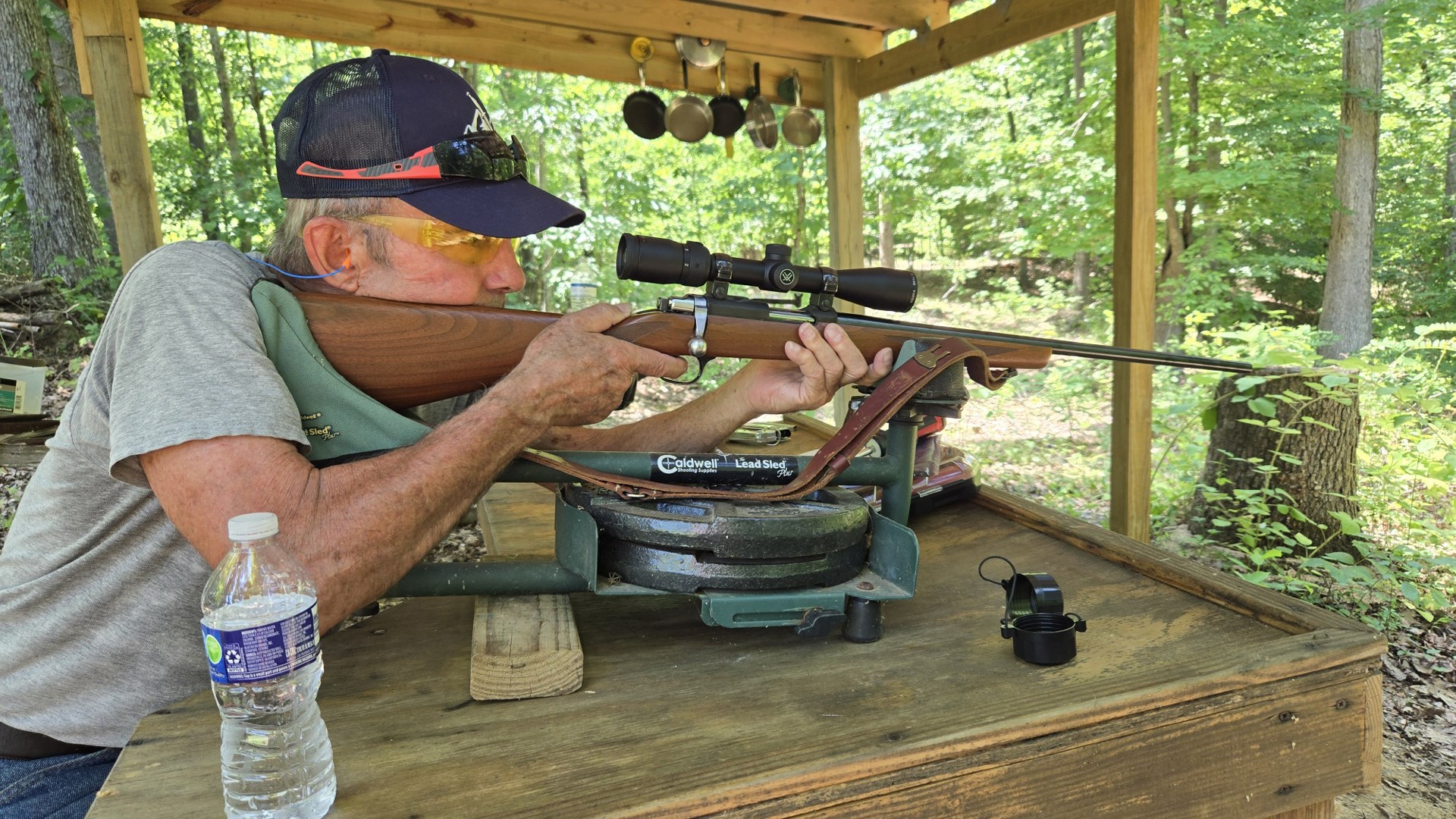 Dad shooting rifle