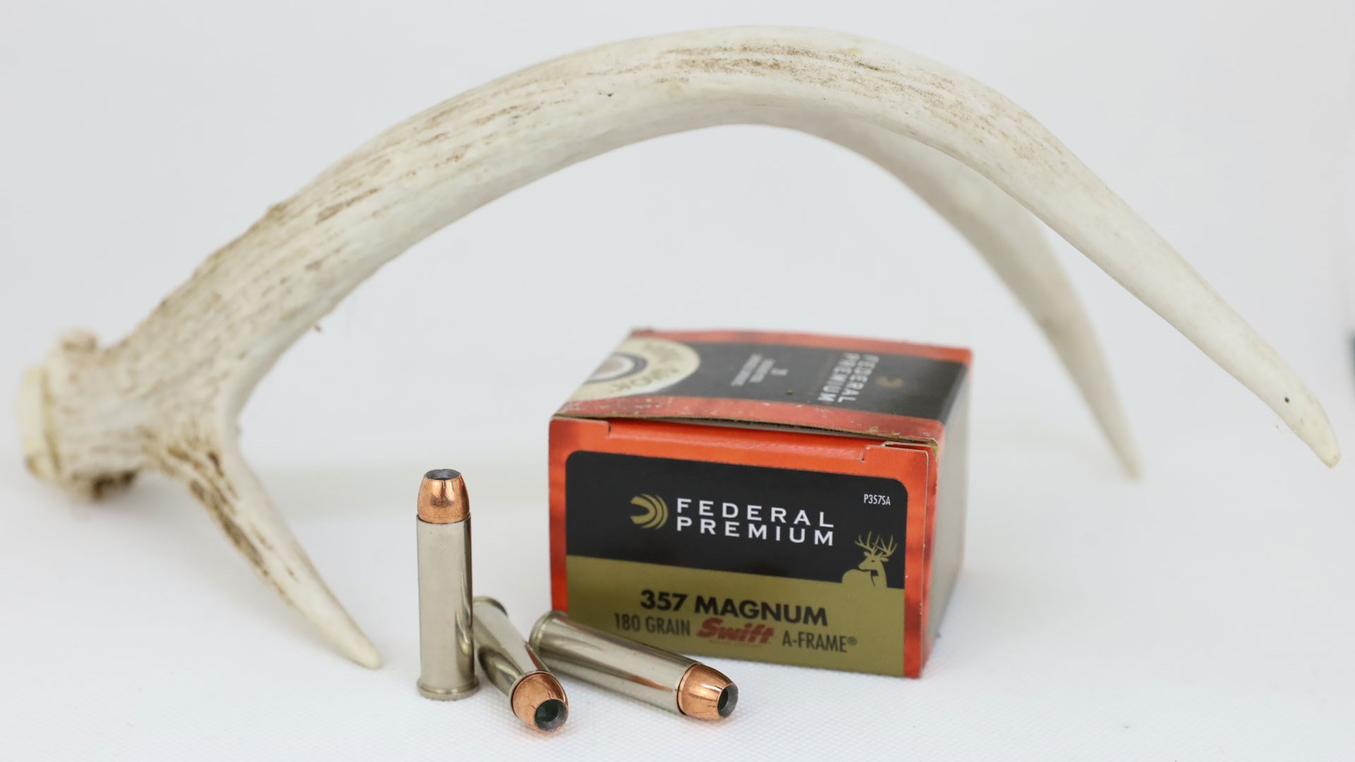 .357 Magnum hollowpoints with antler and box of ammo