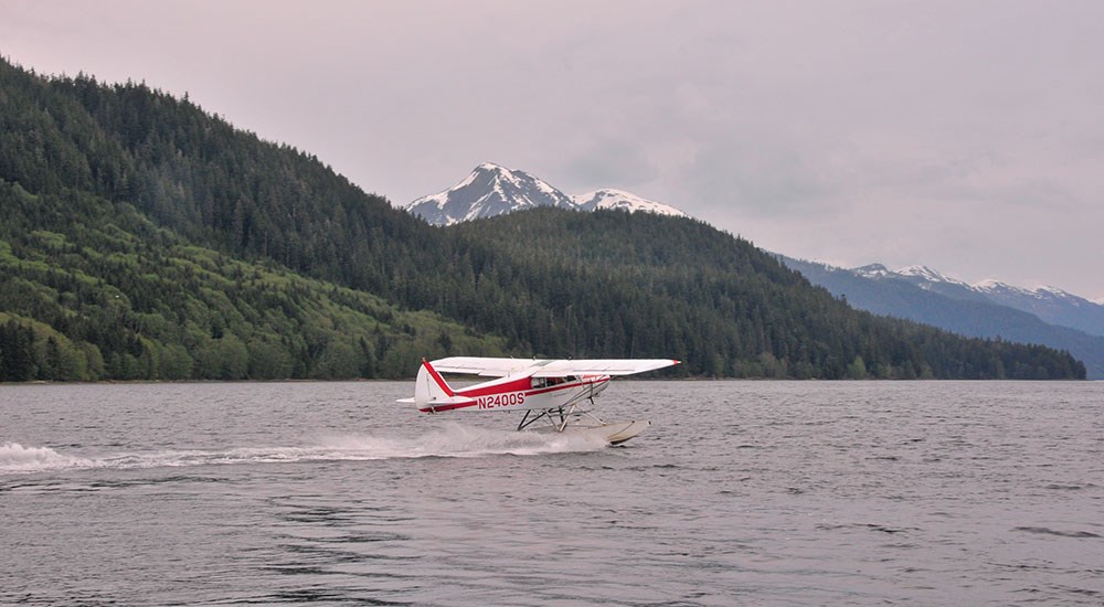 Bush Plane landing on water