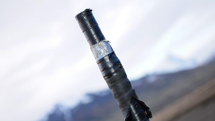 Piece of Used Inner Tube Wrapped around Rifle Muzzle for Grip
