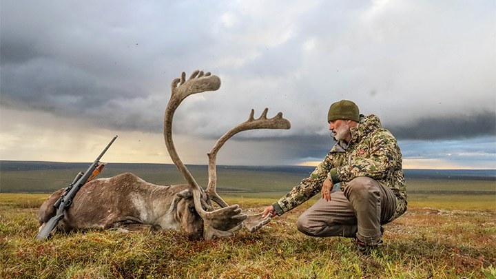 Hunter with Western Arctic Caribou in Alaska