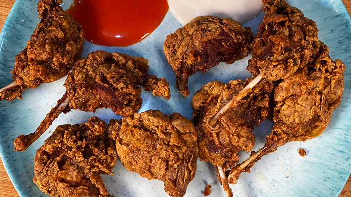 Dry Garlic Duck Legs Served on Plate