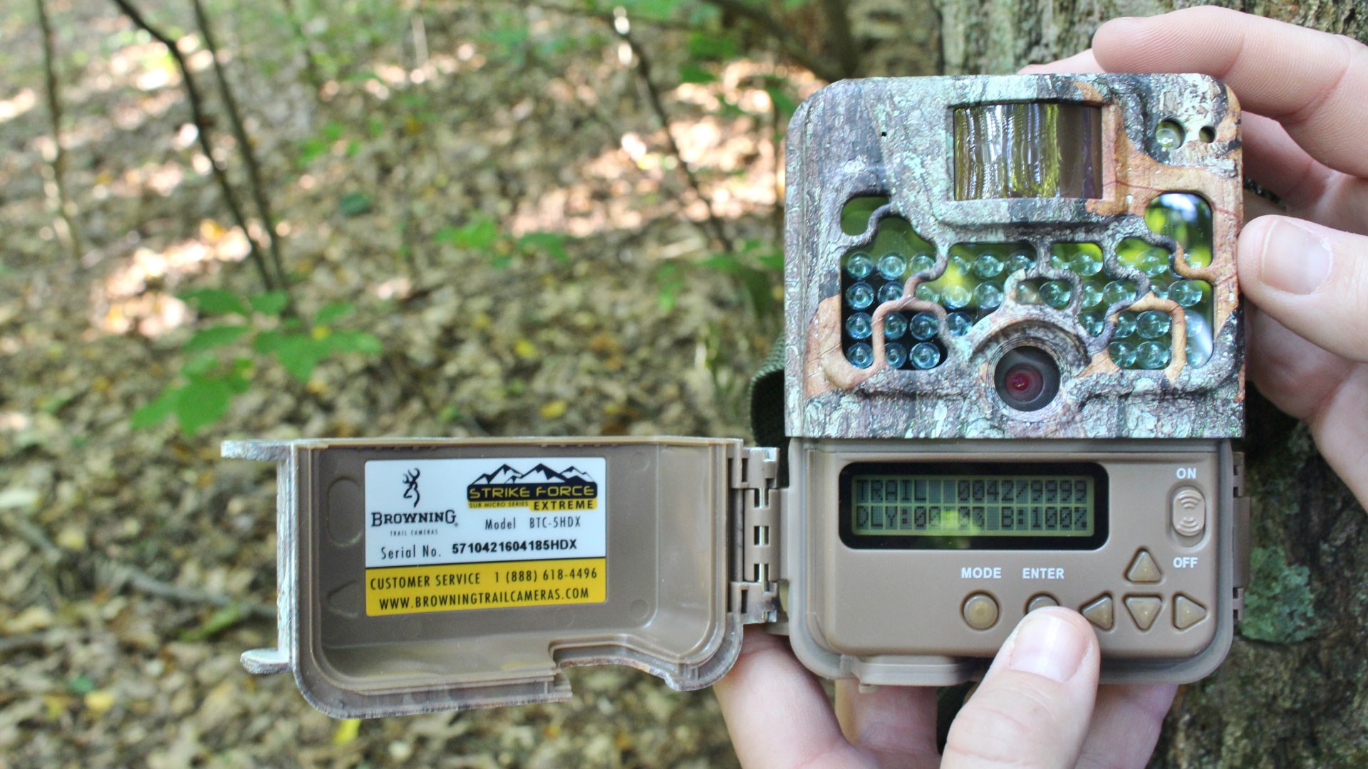Trail camera buttons