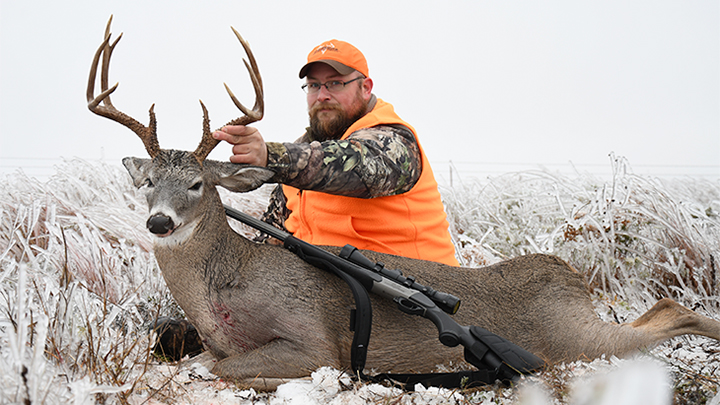 Hunter Posing with Whitetail Buck in Oklahoma