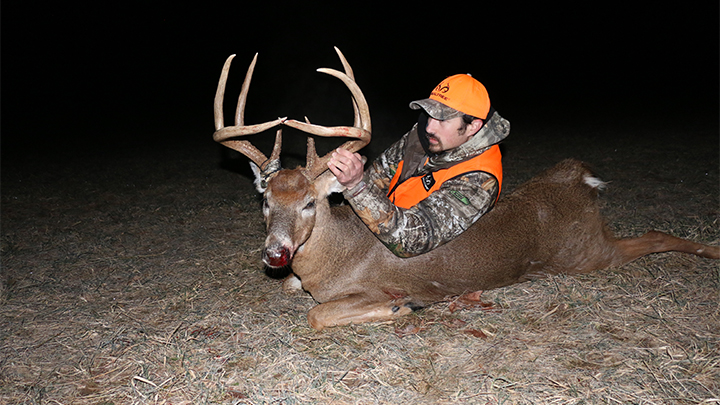 Hunter with Whitetail Buck in Ohio