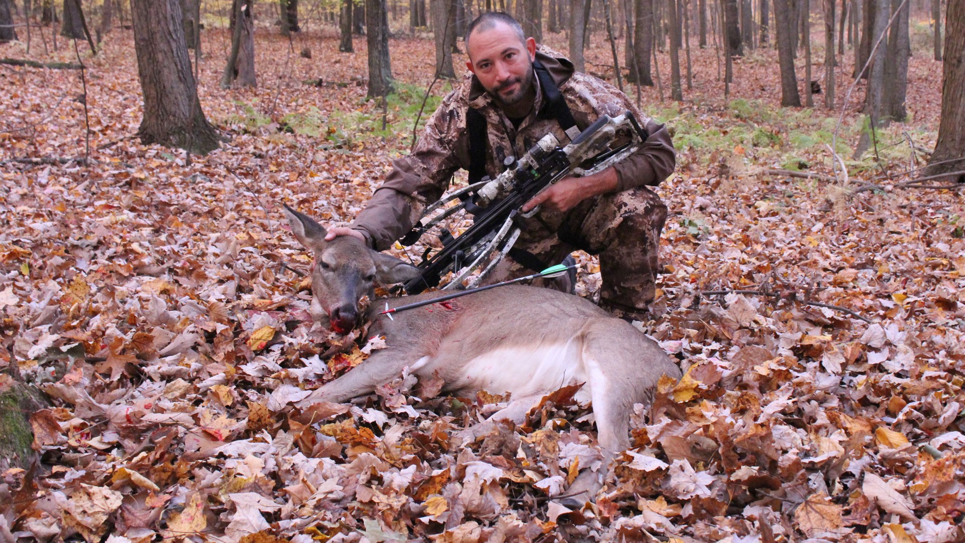 Hunter with doe