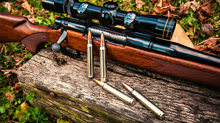 8mm Remington Magnum Cartridges with Rifle