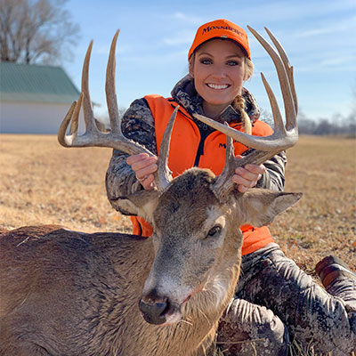 Female Hunter with Whitetail Buck in Kansas