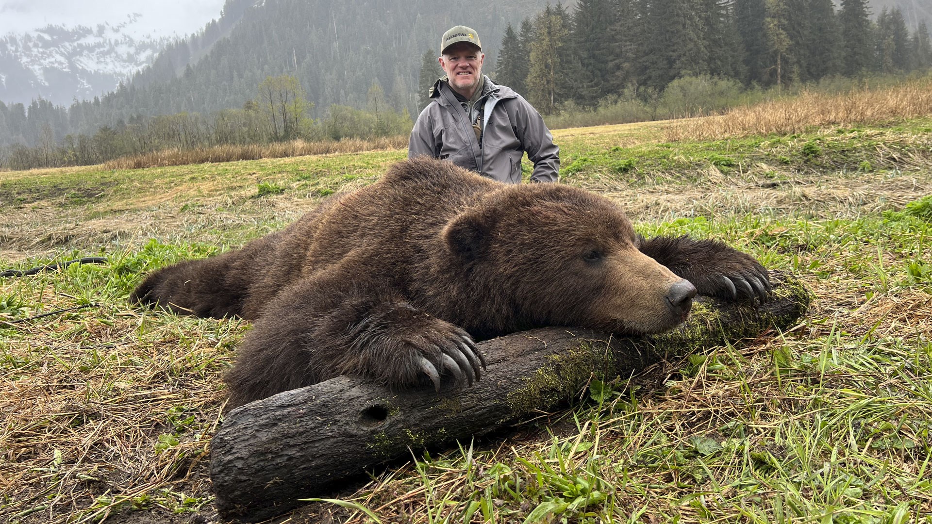 Hunter with bear