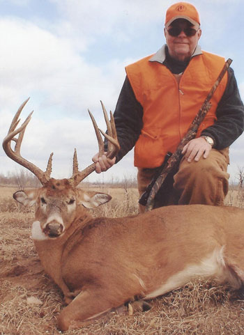 Hunter with buck