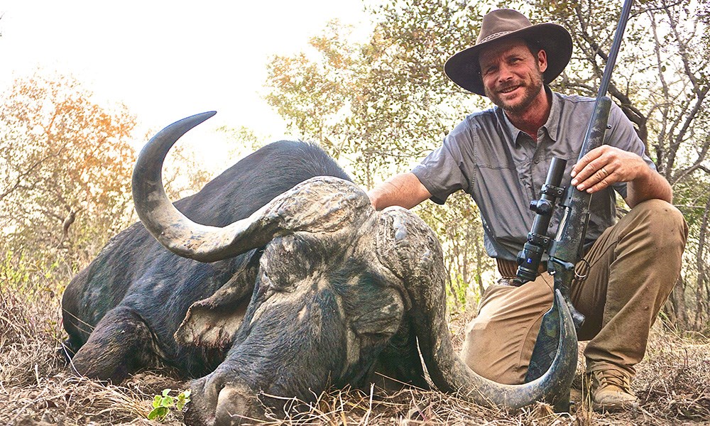 Hunter with Cape buffalo in Mozambique