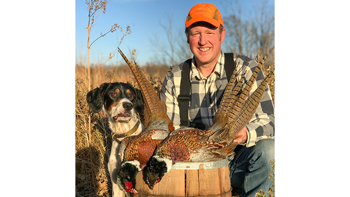 Pheasant hunter with hunting dog