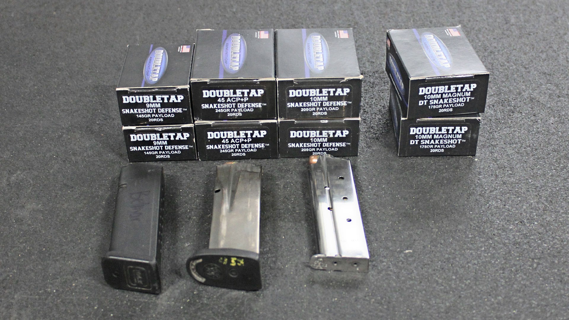 Ammo boxes next to magazines
