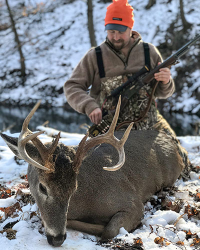 Hunter with Whitetail Buck in Ohio