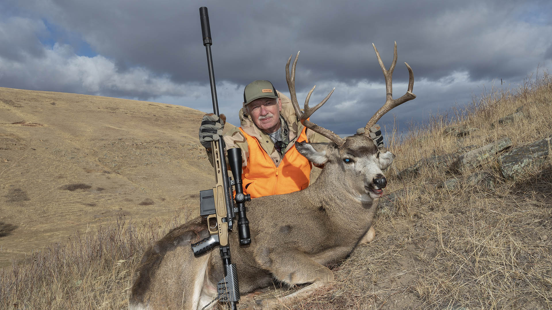Hunter With Mulie And Suppressor