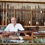 Happy Gun Store Owner