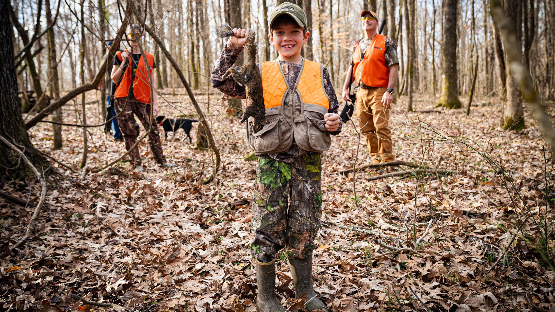 Hunter holds up trophy