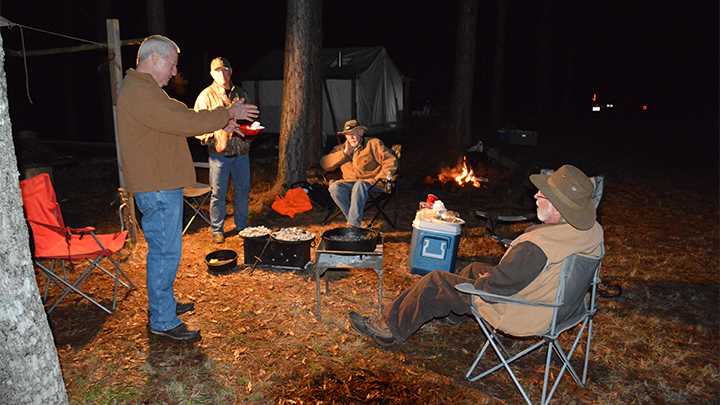 Campers around camp fire