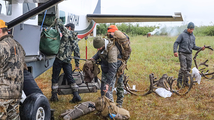 Hunters Loading Onto Small Plane from Alaska