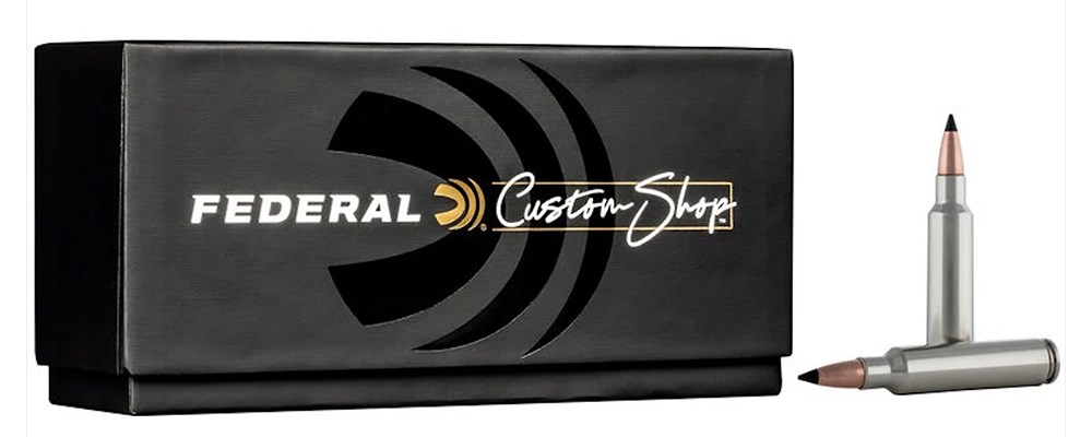 Federal Custom Shop ammunition box with two cartridges on right.
